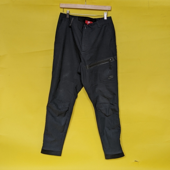 nike tech woven pants